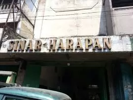 Toko Kaca Sinar Harapan